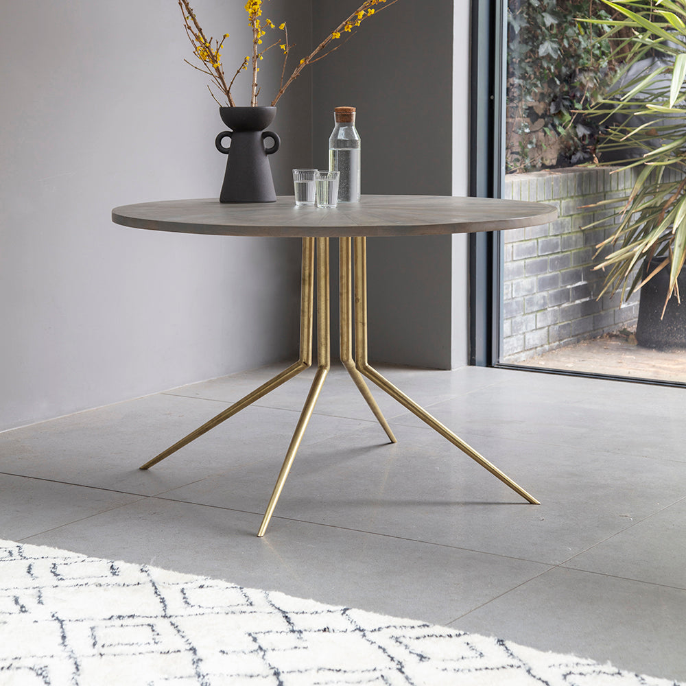 Sunburst Round Dining Table with parquetry design top and Brass tapered legs Grey Wash